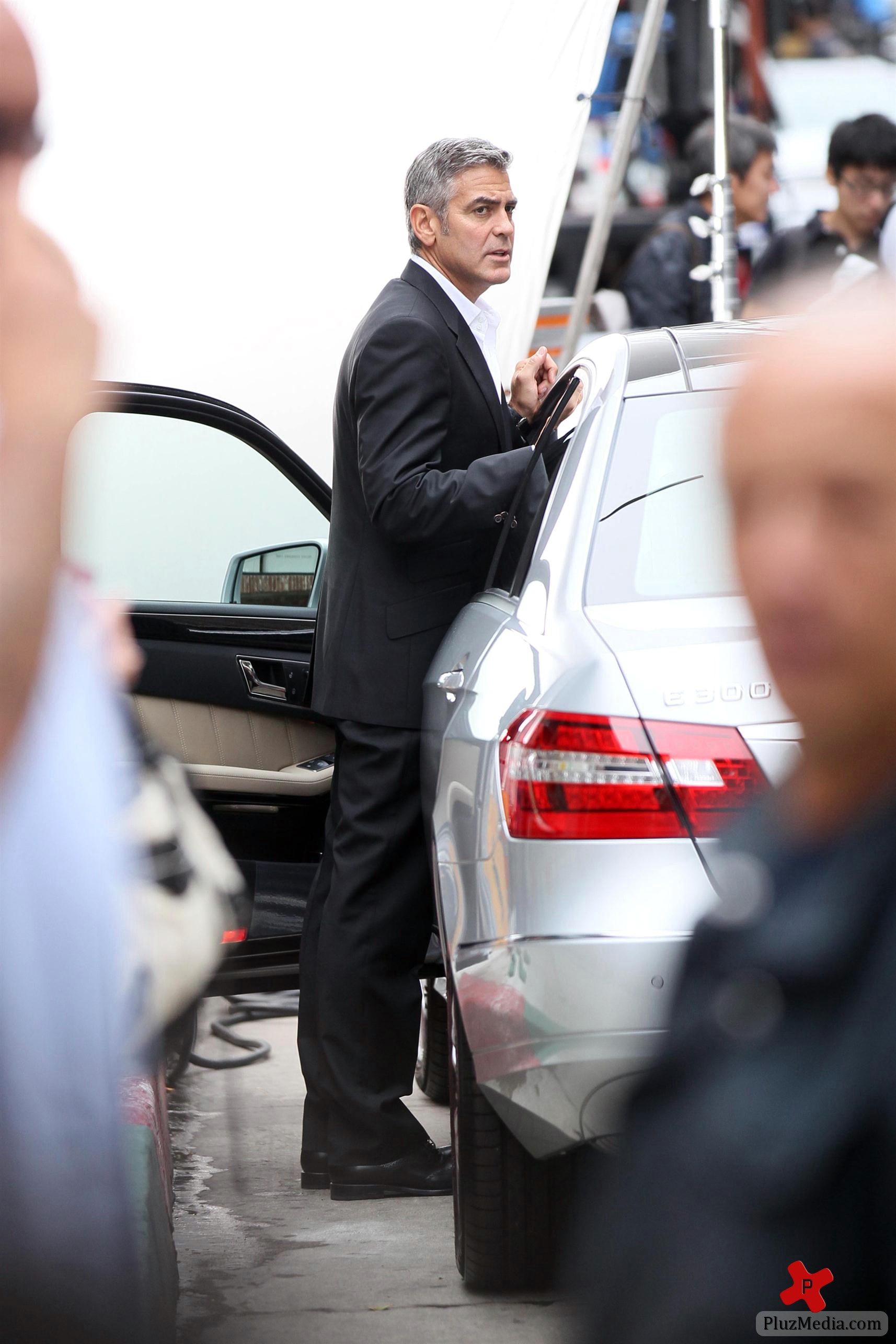 George Clooney on the set of a Mercedes Benz E300 L advert photos | Picture 78330